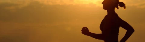 Woman at sunset in an Edmonton running clinic at Apex Body Solutions